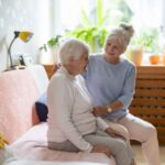 A daughter acting as caregiver to mother in her home