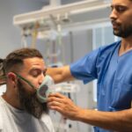 Man receives breathing treatment to support post-covid syndrome